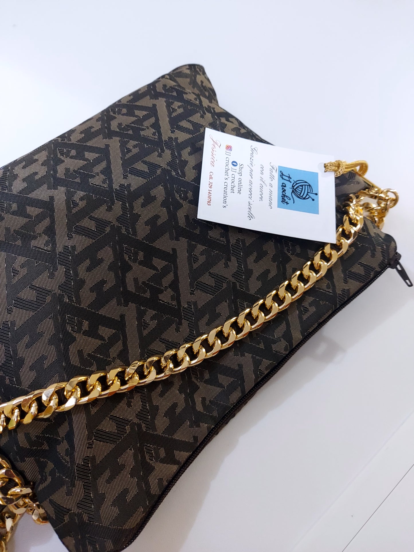 BUSTINA POCHETTE IN TESSUTO MARRONE